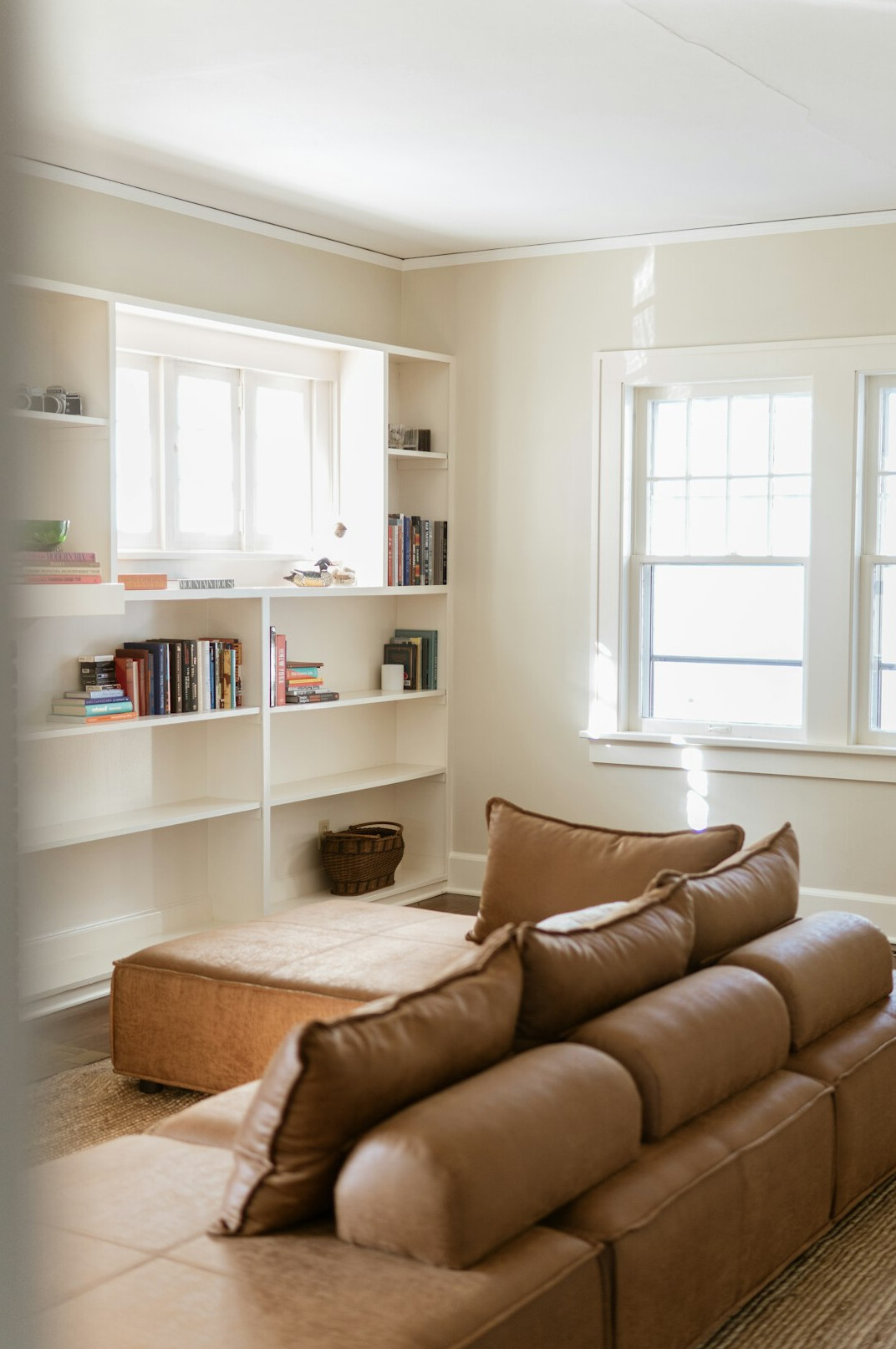 Grand reading room with rows of bookshelves